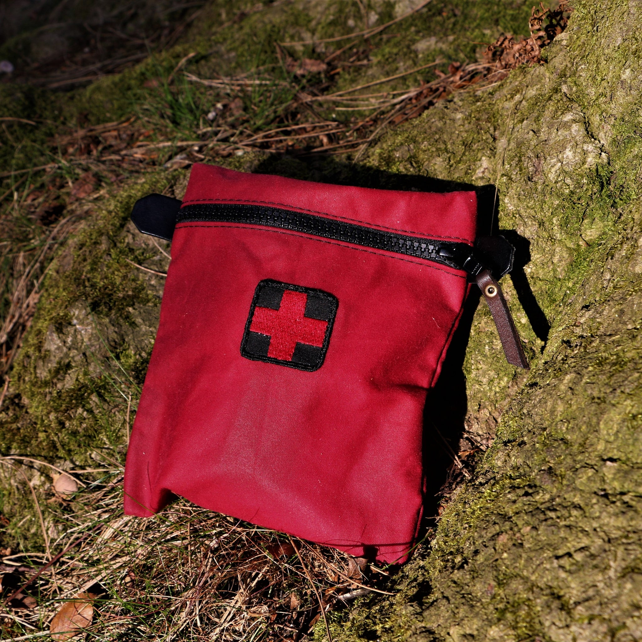 A red wax canvas first aid kit for bushcraft