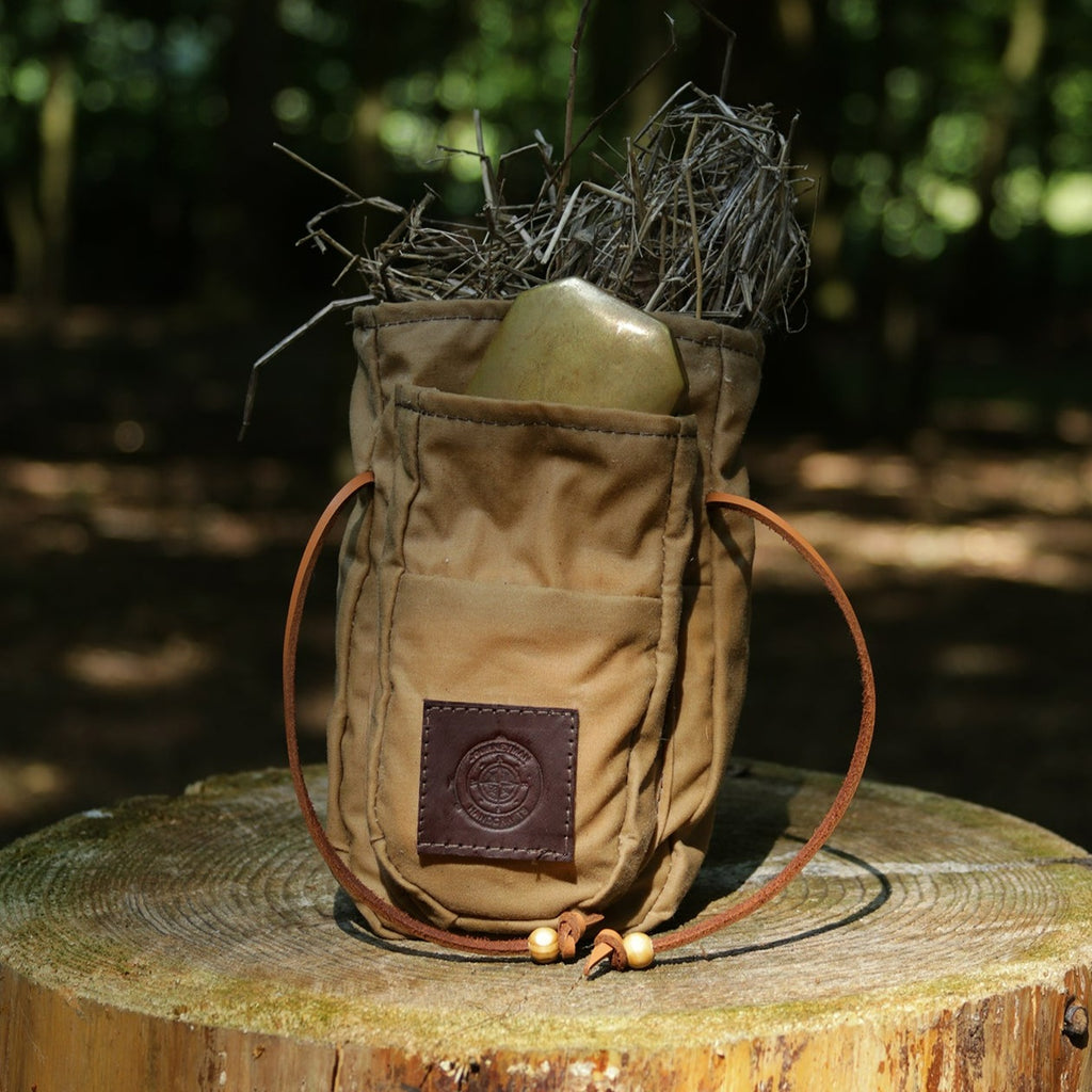 A wax canvas Sami style double coffee pouch