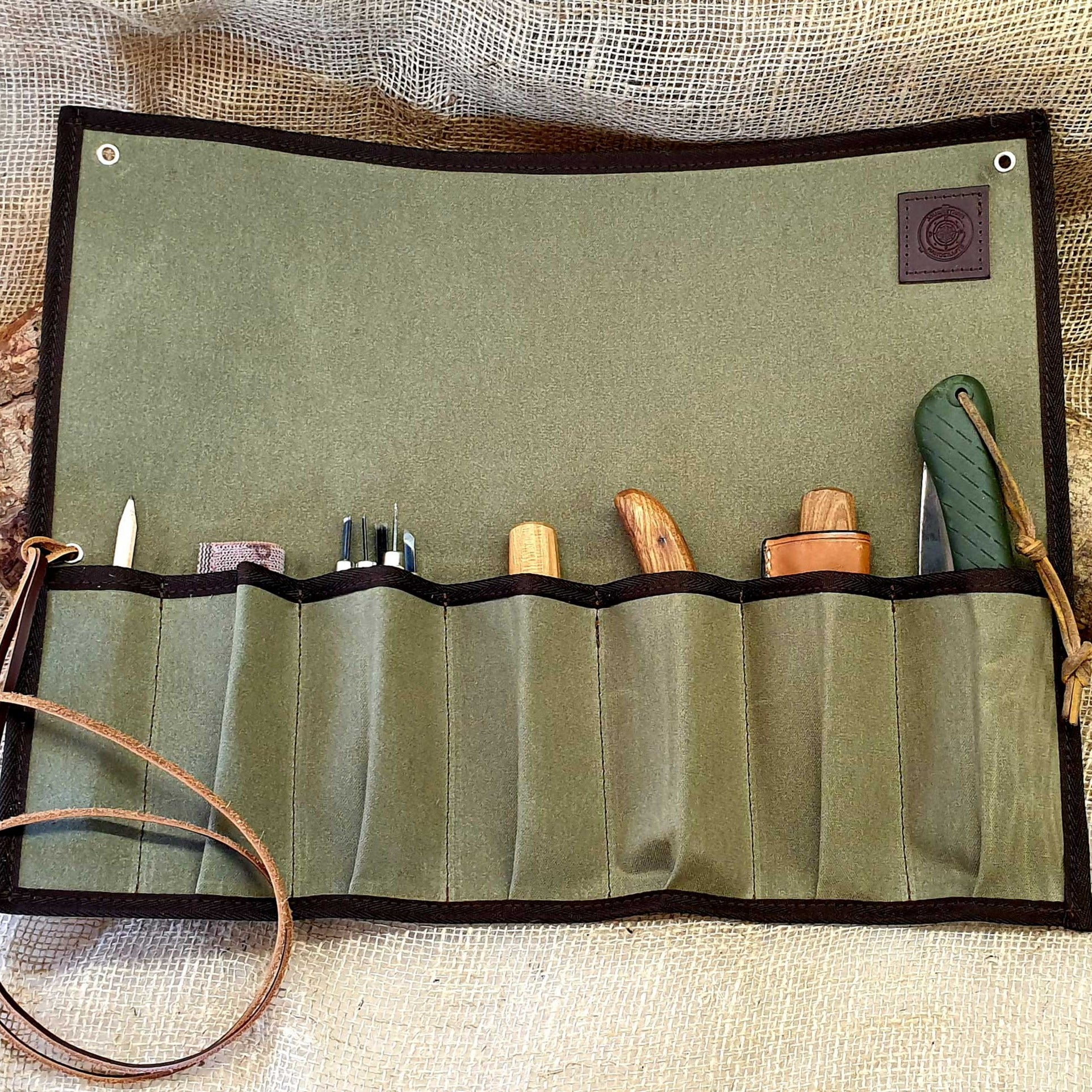 Green canvas tool roll