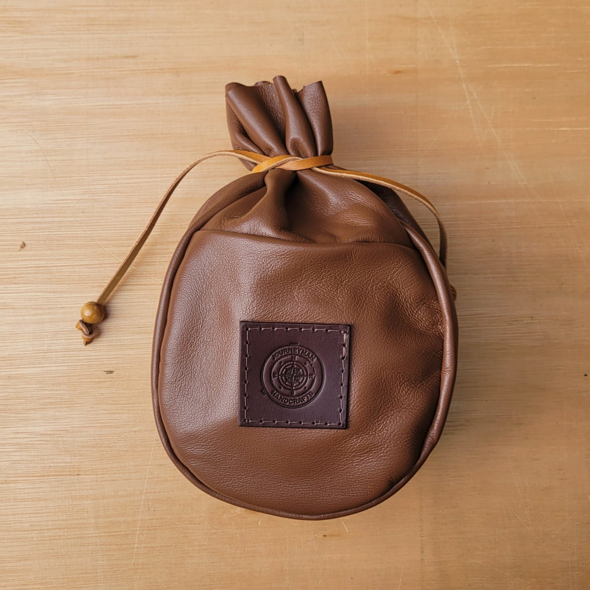 A Sami style leather coffee pouch